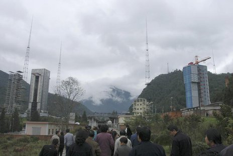 Visitors tour the Xichang Satellite Launch Centre in southwest China's Sichuan province October 18, 2007. REUTERS/China Daily Visitors tour the Xichang Satellite Launch Centre in southwest China's Sichuan province October 18, 2007. REUTERS/China Daily