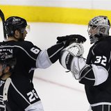 Los Angeles Kings goalie Jonathan Quick (32) celebrates defeating the San Jose Sharks with teammate Los Angeles Kings defenseman Jake Muzzin Los Angeles Kings goalie Jonathan Quick (32) celebrates defeating the San Jose Sharks with teammate Los Angeles Kings defenseman Jake Muzzin