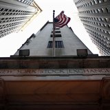 The U.S. flag hangs outside the New York Stock Exchange November 9, 2011. REUTERS/Brendan McDermid The U.S. flag hangs outside the New York Stock Exchange November 9, 2011. REUTERS/Brendan McDermid