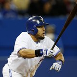Toronto Blue Jays' Melky Cabrera follows through on a RBI double against the San Francisco Giants during the seventh inning of their MLB Ame Toronto Blue Jays' Melky Cabrera follows through on a RBI double against the San Francisco Giants during the seventh inning of their MLB Ame