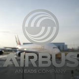 An A380 aircraft is seen through a window with an Airbus logo during the EADS / Airbus 'New Year Press Conference' in Hamburg January 17, 20 An A380 aircraft is seen through a window with an Airbus logo during the EADS / Airbus 'New Year Press Conference' in Hamburg January 17, 20