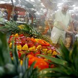 A customer shops along the fruits department in a Sam's Club store, a division of Wal-Mart Stores, in Bentonville, Arkansas June 2, 2011. RE A customer shops along the fruits department in a Sam's Club store, a division of Wal-Mart Stores, in Bentonville, Arkansas June 2, 2011. RE