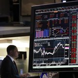 A Bloomberg terminal displays news while traders work on the floor of the New York Stock Exchange, May 13, 2013. REUTERS/Brendan McDermid A Bloomberg terminal displays news while traders work on the floor of the New York Stock Exchange, May 13, 2013. REUTERS/Brendan McDermid