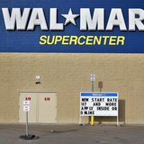 A man stands on a skateboard outside a Wal-Mart store in Williston, North Dakota March 13, 2013. REUTERS/Shannon Stapleton A man stands on a skateboard outside a Wal-Mart store in Williston, North Dakota March 13, 2013. REUTERS/Shannon Stapleton