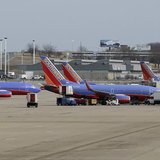 Several Souhtwest Airlines planes are lined up at Terminal two at the Lambert - St. Louis International Airport, in St. Louis, Missouri, Mar Several Souhtwest Airlines planes are lined up at Terminal two at the Lambert - St. Louis International Airport, in St. Louis, Missouri, Mar
