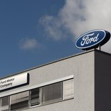 The Ford logo is pictured on the rooftop of Austria's Ford head branch in Vienna March 19, 2013. REUTERS/Heinz-Peter Bader