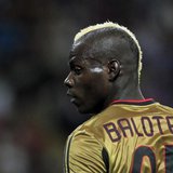 AC Milan's Mario Balotelli looks on during their Italian Serie A soccer match against AS Roma at the San Siro stadium in Milan May 12, 2013. AC Milan's Mario Balotelli looks on during their Italian Serie A soccer match against AS Roma at the San Siro stadium in Milan May 12, 2013.
