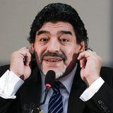 Former Argentine soccer star Diego Maradona gestures during a news conference in Naples February 26, 2013. REUTERS/Ciro De Luca Former Argentine soccer star Diego Maradona gestures during a news conference in Naples February 26, 2013. REUTERS/Ciro De Luca