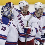 New York Rangers goalie Henrik Lundqvist (30) celebrates defeating the Washington Capitals with team mates Anton Stralman (6) and Derek Step New York Rangers goalie Henrik Lundqvist (30) celebrates defeating the Washington Capitals with team mates Anton Stralman (6) and Derek Step