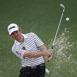 Louis Oosthuizen of South Africa hits from a sand trap on the second hole during second round play in the 2013 Masters golf tournament at th Louis Oosthuizen of South Africa hits from a sand trap on the second hole during second round play in the 2013 Masters golf tournament at th