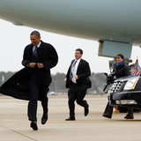 U.S. President Barack Obama runs to greet well-wishers upon his arrival in Newport News, Virginia February 26, 2013. REUTERS/Kevin Lamarque U.S. President Barack Obama runs to greet well-wishers upon his arrival in Newport News, Virginia February 26, 2013. REUTERS/Kevin Lamarque