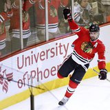 Chicago Blackhawks center Patrick Sharp (10) celebrates his empty net goal against the Detroit Red Wings to clinch Game 1 of their NHL Weste Chicago Blackhawks center Patrick Sharp (10) celebrates his empty net goal against the Detroit Red Wings to clinch Game 1 of their NHL Weste