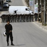 Palestinian police officers block the road to prevent Palestinian demonstrators from marching towards the Jewish settlement of Beit El March Palestinian police officers block the road to prevent Palestinian demonstrators from marching towards the Jewish settlement of Beit El March