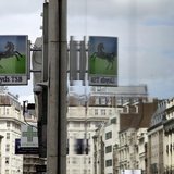 A sign from a branch of a Lloyds bank is reflected in a window in central London May 13, 2013. REUTERS/Stefan Wermuth A sign from a branch of a Lloyds bank is reflected in a window in central London May 13, 2013. REUTERS/Stefan Wermuth