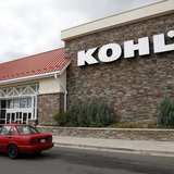 A car drives by the Kohl's department store in Arvada, Colorado August 12, 2010.REUTERS/Rick Wilking