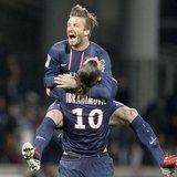 Paris Saint-Germain's Zlatan Ibrahimovic and David Beckham celebrate at the end of their team's French Ligue 1 soccer match against Olympiqu Paris Saint-Germain's Zlatan Ibrahimovic and David Beckham celebrate at the end of their team's French Ligue 1 soccer match against Olympiqu
