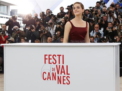 Cast member Emma Watson poses during a photocall for the film 'The Bling Ring' during the 66th Cannes Film Festival in Cannes May 16, 2013. Cast member Emma Watson poses during a photocall for the film 'The Bling Ring' during the 66th Cannes Film Festival in Cannes May 16, 2013.
