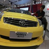 A worker cleans a Toyota Yaris car at the Wuhan Motor Show, Hubei province, October 12, 2012. REUTERS/Stringer A worker cleans a Toyota Yaris car at the Wuhan Motor Show, Hubei province, October 12, 2012. REUTERS/Stringer