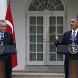 U.S. President Barack Obama (R) reacts to rain starting to fall, as he and Turkish Prime Minister Recep Tayyip Erdogan hold a joint news con U.S. President Barack Obama (R) reacts to rain starting to fall, as he and Turkish Prime Minister Recep Tayyip Erdogan hold a joint news con