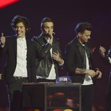 Pop group One Direction react after being awarded the Global Success award at the BRIT Awards, celebrating British pop music, at the O2 Aren Pop group One Direction react after being awarded the Global Success award at the BRIT Awards, celebrating British pop music, at the O2 Aren
