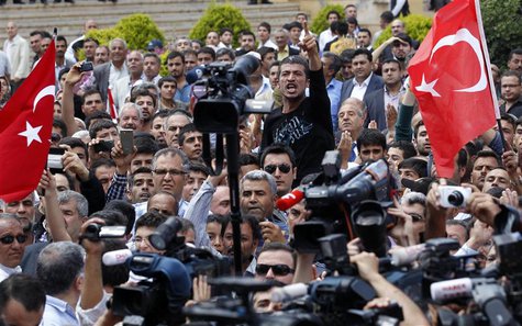 A man shouts as Turkey's President Abdullah Gul talks to people during his visit to one of the two blast sites, which resulted in the deaths A man shouts as Turkey's President Abdullah Gul talks to people during his visit to one of the two blast sites, which resulted in the deaths