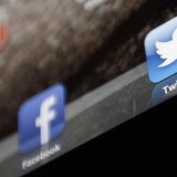 An illustration picture shows the log-on icon for the Website Facebook and Twitter on an Ipad in Bordeaux, Southwestern France, January 30, An illustration picture shows the log-on icon for the Website Facebook and Twitter on an Ipad in Bordeaux, Southwestern France, January 30,