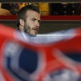 Paris Saint-Germain's David Beckham takes his seat in the stands during their French Ligue 1 soccer match against Valenciennes at the Parc d Paris Saint-Germain's David Beckham takes his seat in the stands during their French Ligue 1 soccer match against Valenciennes at the Parc d
