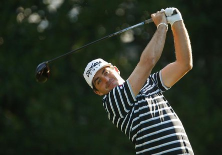 Keegan Bradley watches his tee shot on the 11th hole during the first round of The Players Championship PGA golf tournament at TPC Sawgrass Keegan Bradley watches his tee shot on the 11th hole during the first round of The Players Championship PGA golf tournament at TPC Sawgrass