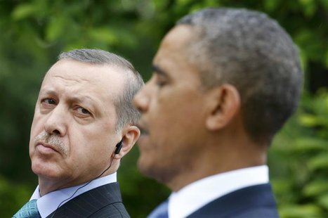 Turkish Prime Minister Recep Tayyip Erdogan (L) listens to U.S. President Barack Obama during a joint news conference in the White House Ros Turkish Prime Minister Recep Tayyip Erdogan (L) listens to U.S. President Barack Obama during a joint news conference in the White House Ros