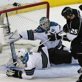 San Jose Sharks Joe Pavelski dives to block the puck in front of goalie Antti Niemi as Los Angeles Kings Dustin Penner (R) looks on during G San Jose Sharks Joe Pavelski dives to block the puck in front of goalie Antti Niemi as Los Angeles Kings Dustin Penner (R) looks on during G