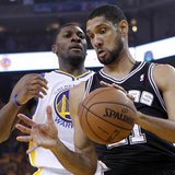 San Antonio Spurs' Tim Duncan (R) takes a rebound from Golden State Warriors' Festus Ezeli during Game 6 of their NBA Western Conference sem San Antonio Spurs' Tim Duncan (R) takes a rebound from Golden State Warriors' Festus Ezeli during Game 6 of their NBA Western Conference sem