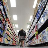 A shopper walks down an aisle in a newly opened Walmart Neighborhood Market in Chicago in this September 21, 2011 file photo. REUTERS/Jim Yo A shopper walks down an aisle in a newly opened Walmart Neighborhood Market in Chicago in this September 21, 2011 file photo. REUTERS/Jim Yo