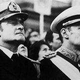 Argentine Army General Jorge Videla (R), leader of the 1976 military coup that began the seven-year "Dirty War," stands next to junta member Argentine Army General Jorge Videla (R), leader of the 1976 military coup that began the seven-year "Dirty War," stands next to junta member