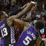 Miami Heat's LeBron James (C) is defended by Sacramento Kings' Tyreke Evans and John Salmons (R) during the first half of their NBA basketba Miami Heat's LeBron James (C) is defended by Sacramento Kings' Tyreke Evans and John Salmons (R) during the first half of their NBA basketba