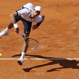Novak Djokovic of Serbia serves to Tomas Berdych of Czech Republic during their men's singles quarter final match at the Rome Masters tennis Novak Djokovic of Serbia serves to Tomas Berdych of Czech Republic during their men's singles quarter final match at the Rome Masters tennis