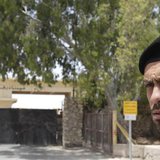 A member of Hamas security forces stands guard in front of the closed gate of the Rafah crossing with Egypt, in the southern Gaza Strip May A member of Hamas security forces stands guard in front of the closed gate of the Rafah crossing with Egypt, in the southern Gaza Strip May