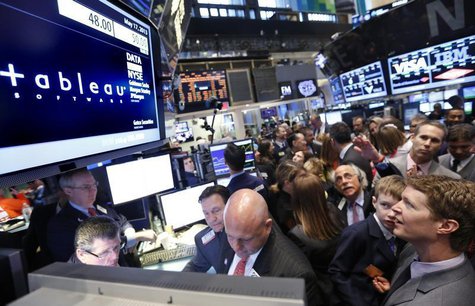 Christian Chabot, (bottom R) CEO of Tableau Software, waits for his company's stock to begin trading on the floor of the New York Stock Exch Christian Chabot, (bottom R) CEO of Tableau Software, waits for his company's stock to begin trading on the floor of the New York Stock Exch