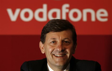 Vodafone's new Chief Executive Vittorio Colao poses for photos after their company's annual general meeting in a conference centre in Westmi Vodafone's new Chief Executive Vittorio Colao poses for photos after their company's annual general meeting in a conference centre in Westmi