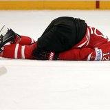 Canada's Eric Staal (R) lies injured on the ice during their 2013 IIHF Ice Hockey World Championship quarter-final match against Sweden at t Canada's Eric Staal (R) lies injured on the ice during their 2013 IIHF Ice Hockey World Championship quarter-final match against Sweden at t