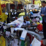 Amir Ismagulov, the father of Azamat Tazhayakov, visits the makeshift memorial for the victims of the Boston Marathon bombings in Boston, Ma Amir Ismagulov, the father of Azamat Tazhayakov, visits the makeshift memorial for the victims of the Boston Marathon bombings in Boston, Ma