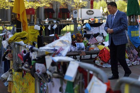 Amir Ismagulov, the father of Azamat Tazhayakov, visits the makeshift memorial for the victims of the Boston Marathon bombings in Boston, Ma Amir Ismagulov, the father of Azamat Tazhayakov, visits the makeshift memorial for the victims of the Boston Marathon bombings in Boston, Ma