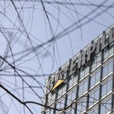 The company logo is seen on top of a building, where Caterpillar (China) Investment Co., Ltd. is located, in Beijing, January 22, 2013. REUT The company logo is seen on top of a building, where Caterpillar (China) Investment Co., Ltd. is located, in Beijing, January 22, 2013. REUT