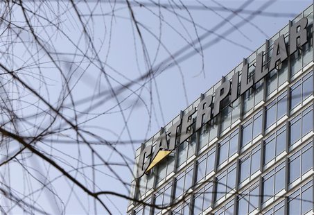 The company logo is seen on top of a building, where Caterpillar (China) Investment Co., Ltd. is located, in Beijing, January 22, 2013. REUT The company logo is seen on top of a building, where Caterpillar (China) Investment Co., Ltd. is located, in Beijing, January 22, 2013. REUT
