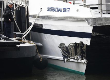 New York City emergency responders investigate a commuter ferry crash that occurred during the morning rush in New York, in this January 9, New York City emergency responders investigate a commuter ferry crash that occurred during the morning rush in New York, in this January 9,