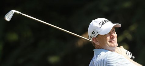 Tom Gillis of the U.S. tees off on the first hole during the final round of the Malaysia's Asia Pacific Classic golf tournament in Kuala Lum Tom Gillis of the U.S. tees off on the first hole during the final round of the Malaysia's Asia Pacific Classic golf tournament in Kuala Lum