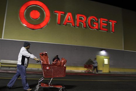 A man pushes a shopping cart at Target on the Thanksgiving Day holiday in Burbank, California, November 22, 2012. REUTERS/Jonathan Alcorn A man pushes a shopping cart at Target on the Thanksgiving Day holiday in Burbank, California, November 22, 2012. REUTERS/Jonathan Alcorn