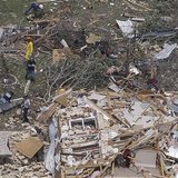 Rescue workers go through the debris of a house left flattened by a tornado in this aerial photograph taken over Granbury, Texas on May 16, Rescue workers go through the debris of a house left flattened by a tornado in this aerial photograph taken over Granbury, Texas on May 16,