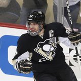 Pittsburgh Penguins' Sidney Crosby reacts after scoring against the Ottawa Senators during the first period of Game 2 of their NHL Eastern C Pittsburgh Penguins' Sidney Crosby reacts after scoring against the Ottawa Senators during the first period of Game 2 of their NHL Eastern C
