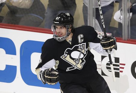 Pittsburgh Penguins' Sidney Crosby reacts after scoring against the Ottawa Senators during the first period of Game 2 of their NHL Eastern C Pittsburgh Penguins' Sidney Crosby reacts after scoring against the Ottawa Senators during the first period of Game 2 of their NHL Eastern C