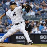 New York Yankees starting pitcher Hiroki Kuroda throws a pitch to the Toronto Blue Jays in the first inning of their MLB American League bas New York Yankees starting pitcher Hiroki Kuroda throws a pitch to the Toronto Blue Jays in the first inning of their MLB American League bas
